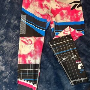 Reebok Pink and Blue Performance Leggings with Tie-Dye and Geometric Design
